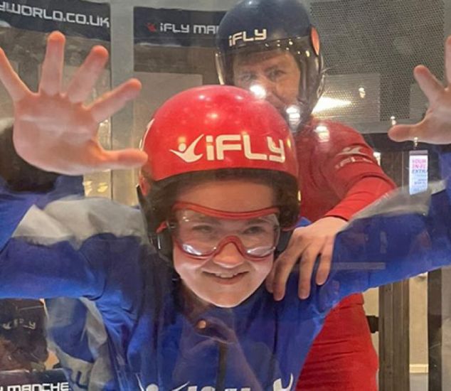 Young person enjoying a skydiving experience